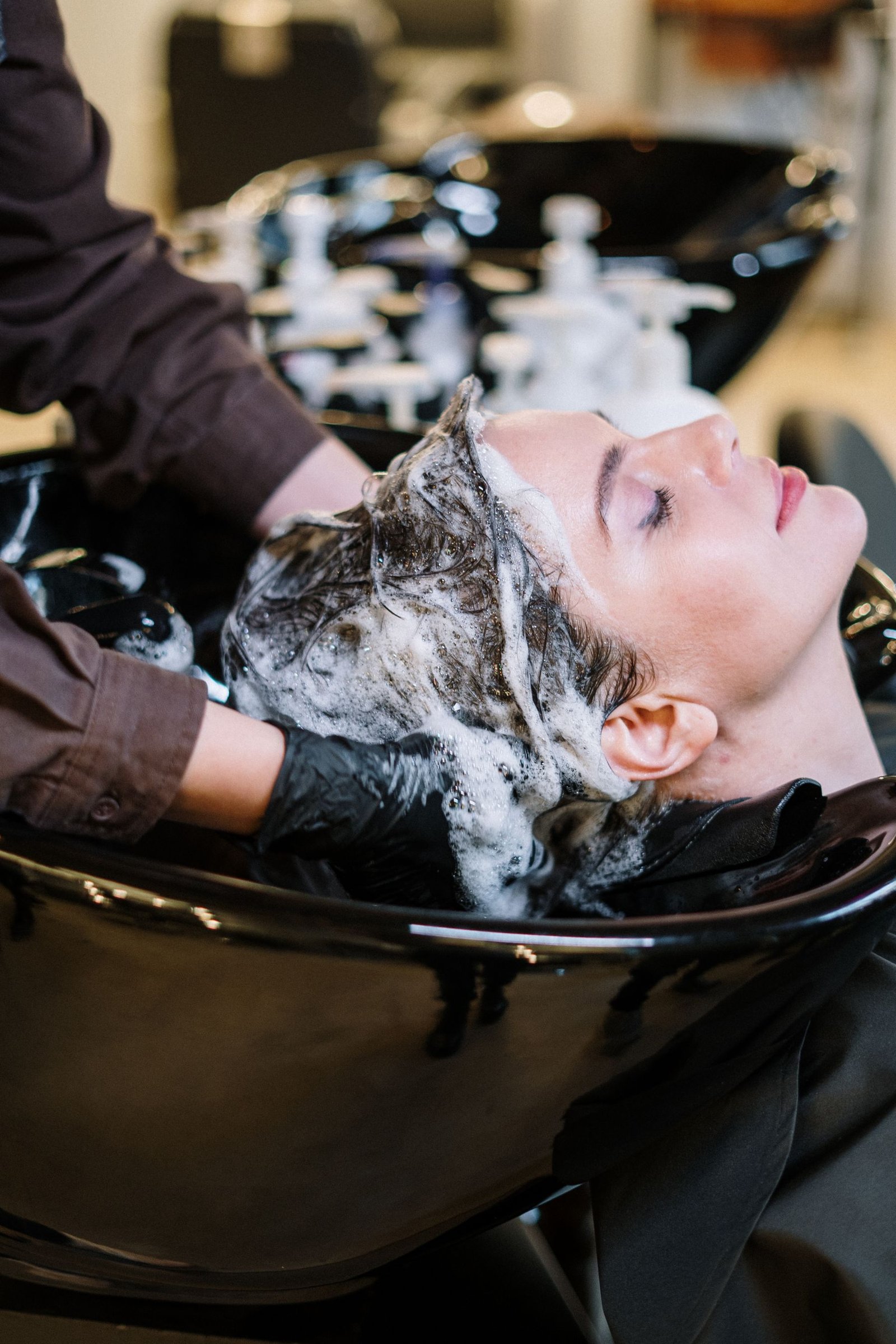 Professional stylist creating a polished salon look